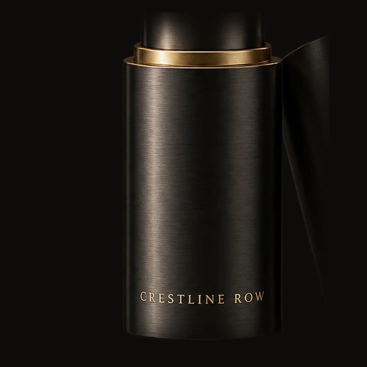 Hairline brass band and engraved Crestline Row wordmark on the tube